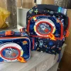 Mochila Escolar, Lunchera Y Monedero. Space. Vest